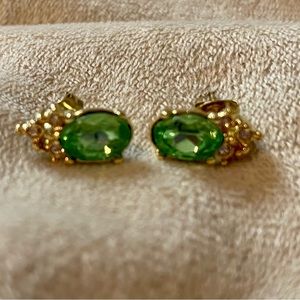 Vintage  oval shaped earrings with posts. Green/Gold in color.